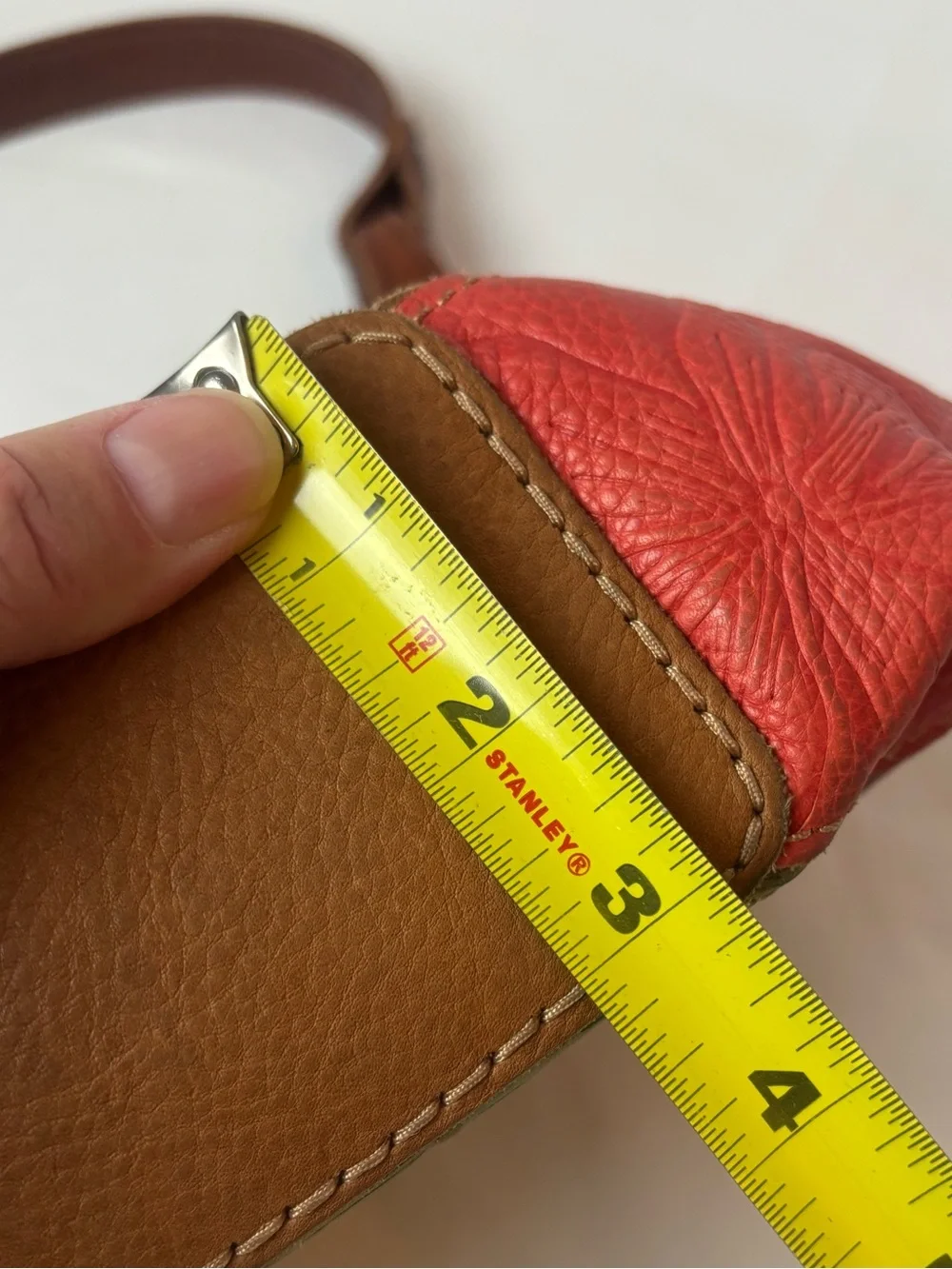 Fossil tooled leather